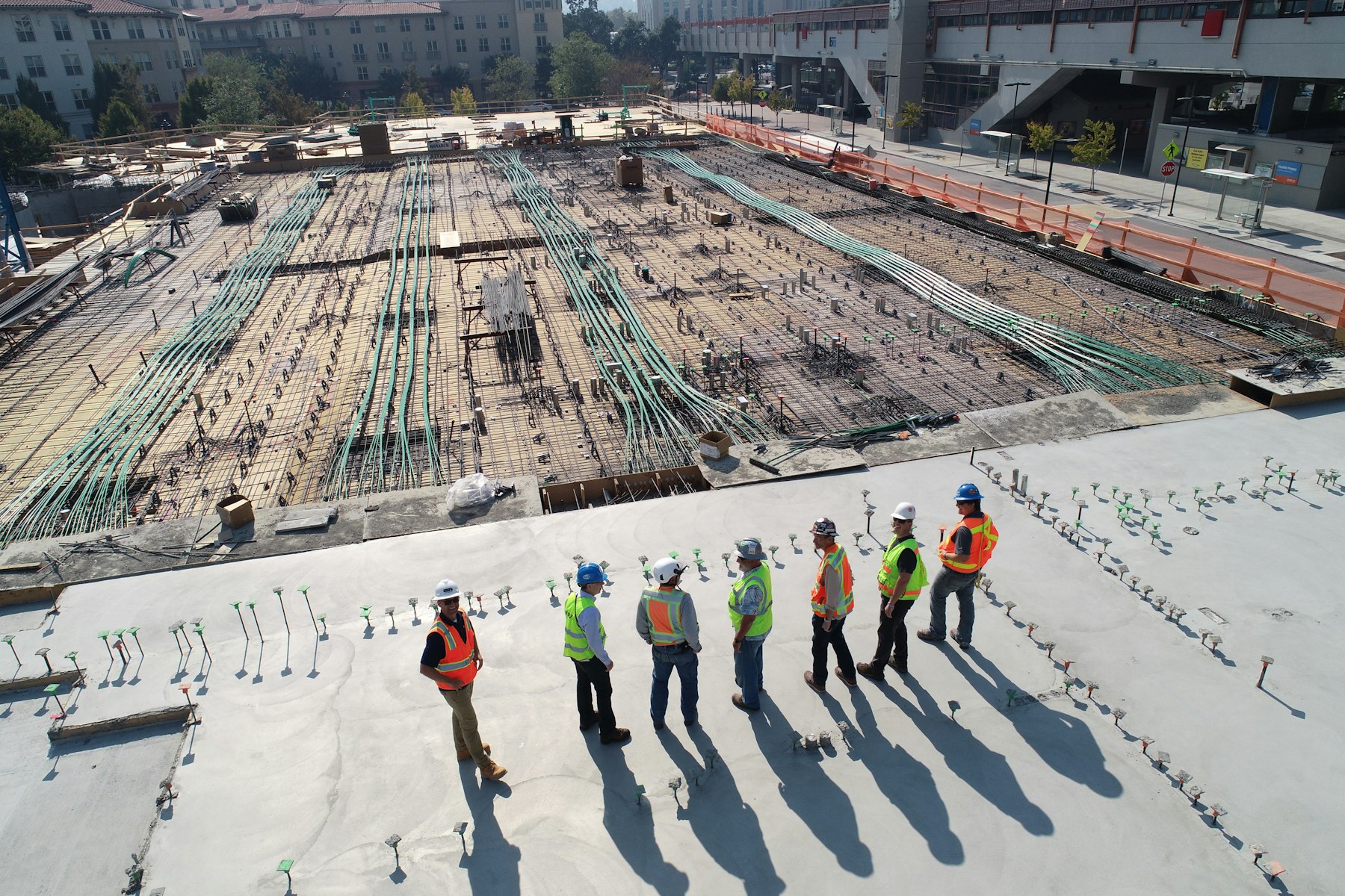 AGG project milestones — construction site and team